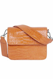 Cayman Shiny Strap Bag | Pastel orange | Lys orange laktaske fra Hvisk